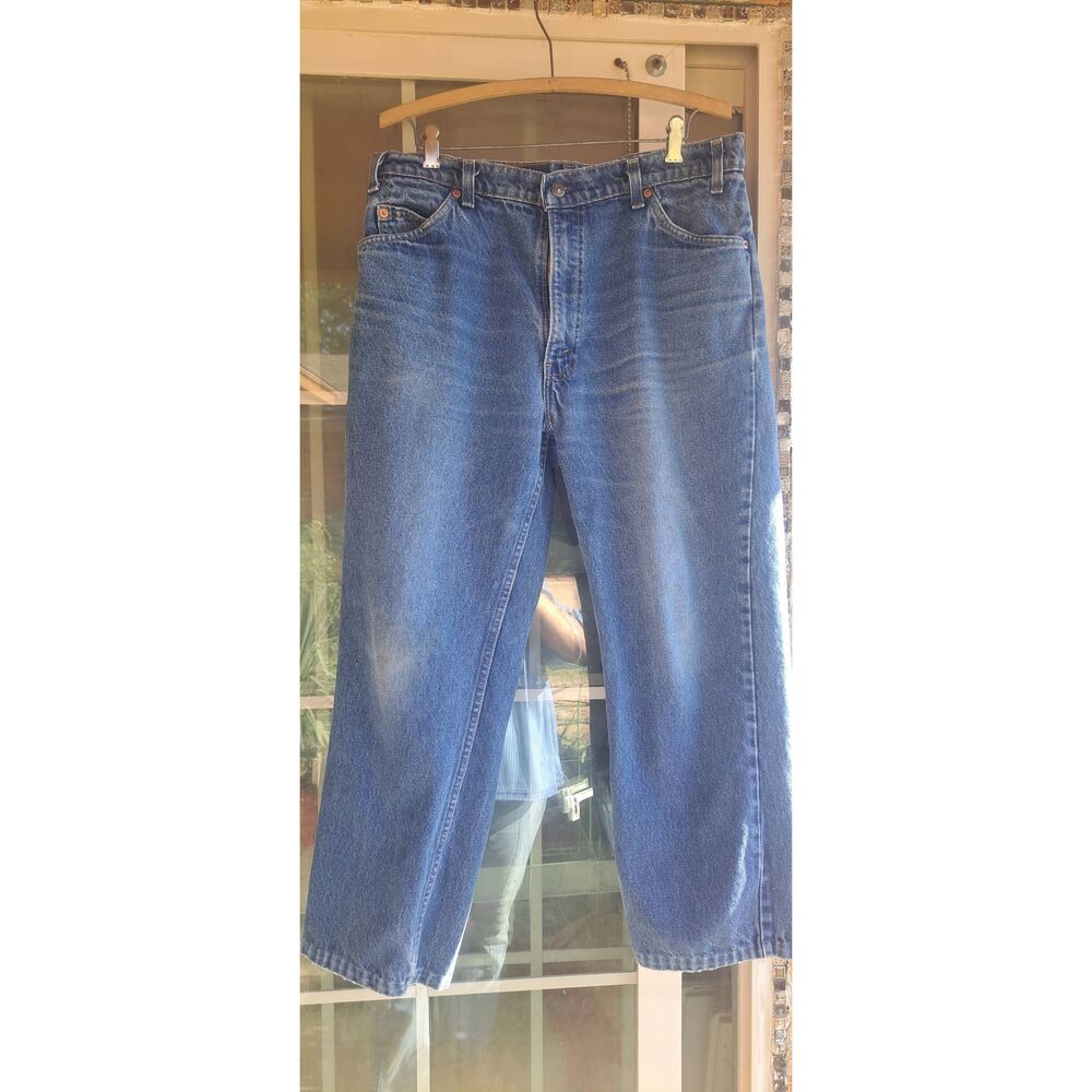 Vintage Levi’s 557 Jeans Men’s 35x30 Made in USA Orange Tab Medium Wash Denim